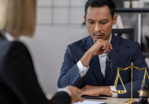 business discussion between professional man and woman