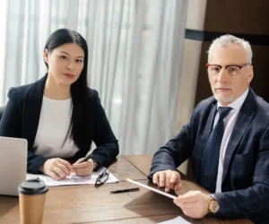 business-professionals-meeting-at-wooden-table-in-2026-01-09-12-27-49-utc Smart Financial Planning 4