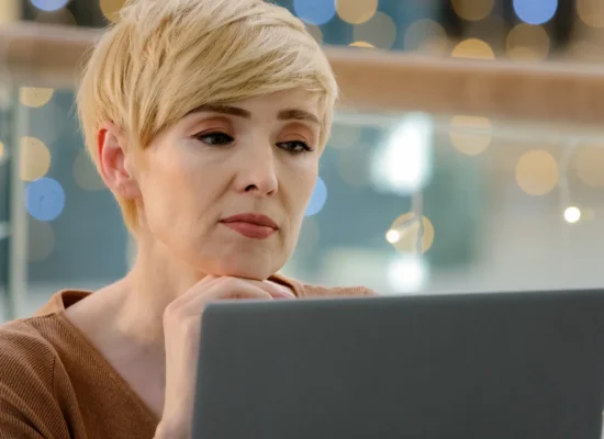 professional-woman-working-on-laptop-in-office-2026-03-24-10-27-11-utc Virtual Divorce Mediation 4